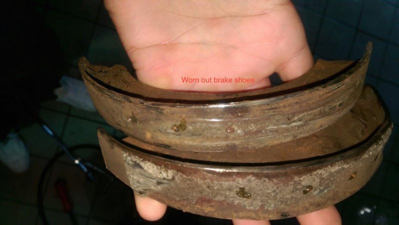 Completely worn out brake shoe.jpg